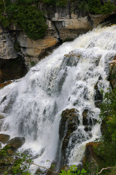 Side of Inglis Falls and layered rock cliff