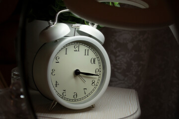 old alarm clock on the table