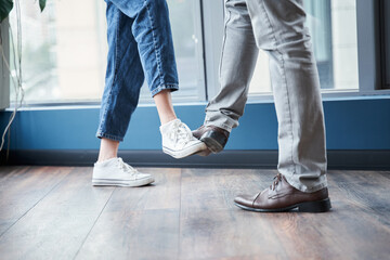 Fototapeta premium Informal greeting foot bump by business people