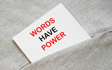 Words have power. Motivational phrase on a note .