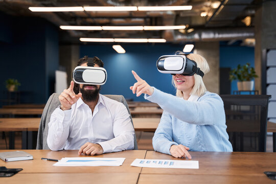 Office worker or businessman using oculus rift headset