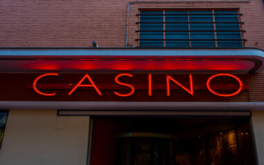Red casino neon sign. Neon lights.