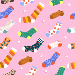 Trendy Christmas socks seamless pattern. Cute hand drawn cartoon socks on pink background. Variety of funny socks. Modern illustration for stationery, web, textile, wrapping paper