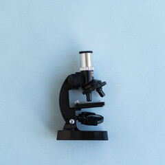 A metal robot and an electronic board that can be programmed. Robotics and electronics. DIY robotics. Mathematics, engineering, science, technology, computer code. STEM and STEAM. 