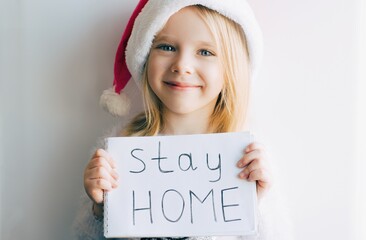 merry xmas and happy new year, childhood, holidays concept. Christmas online holiday.Stay home.Sticker with inscription stay at home - 396189551
