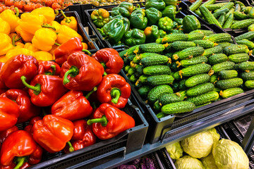 View on the shelf with vegetables in the store, food background.