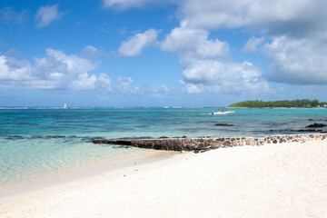 Fototapeta na wymiar Mauritius island: Beach with turquoise lagoon, coral reef