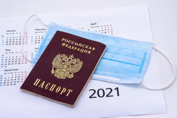Russian passport. Calendar and face mask. Medical mask and calendar on white background.