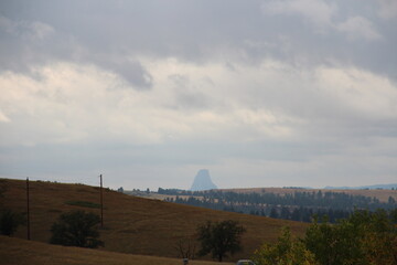 The view from afar of Devils tower in Wyoming.