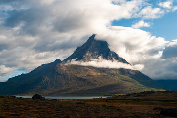 Mountain among clouds in South Greenland