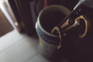walking sticks in umbrella stand