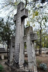Three Romanian crosses in a graveyard in Bucharest, Romania. 