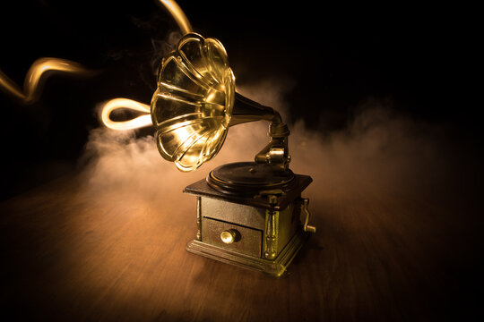 Old gramophone on a dark background. Music concept