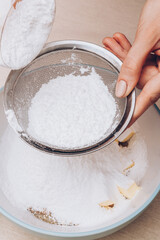 Dough preparation process, mixing of ingredients. Selective focus.