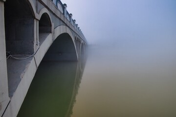 bridge under fog