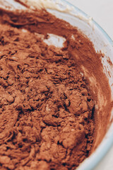 Cacao dough close-up in a bowl. Macro shot. Liquid dough.