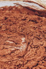 Cacao dough close-up in a bowl. Macro shot. Liquid dough.