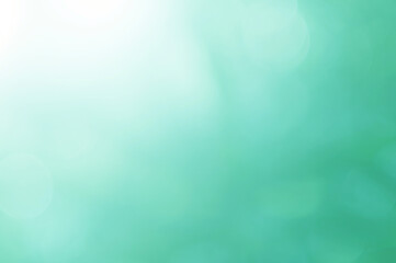 Green Mint Leaf background. Blurred leaves and circular bokeh. Abstract for design and wallpaper.