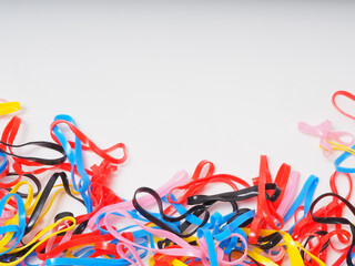Macro shoot of multi color rubber bands on an isolated background