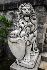 Sinaia, Romania, May 15, 2019: Lion sculpture near Peles castle.