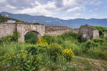 Fototapeta premium Mogren Fortress on a seaside hill in Budva city, Montenegro