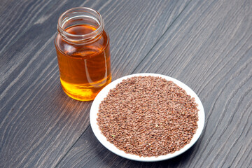 flaxseed and oil close-up. vitamins and healthy food