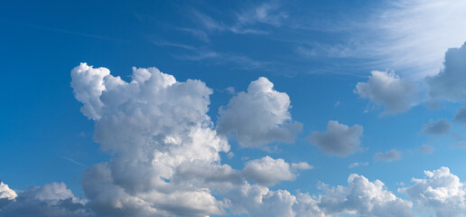 Beautiful Cumulus clouds on a blue skies background.