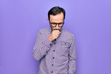 Fototapeta premium Middle age handsome man wearing casual shirt and glasses over isolated white background feeling unwell and coughing as symptom for cold or bronchitis. Health care concept.