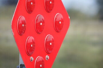 A Red Reflector Sign to Stop Entry into a Canal