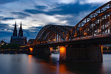 Fototapeta na wymiar Cologne Cathedral and Hohenzollern Bridge at twilight, Germany