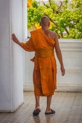 BANGKOK, THAILAND, 12 JANUARY 2020: Monk walking in the Loha Prasat Temple, also called the 