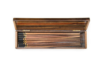 Isolated of Wooden chopsticks in wooden box