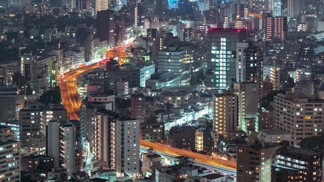 Zoom In Night Timelapse Of A Busy Road High Way In Tokyo Japan
