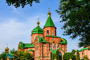 Fototapeta na wymiar Orthodox church in village Kamiani Potoky, Ukraine. Church of the Blessed Virgin Mary intercession (Pokrovsky temple)