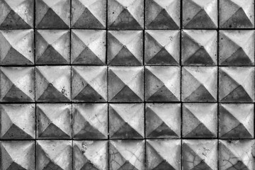 Pattern of pyramid mosaic tiles on the wall  texture background