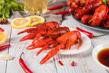 closeup gourmet  lobster on white wooden table