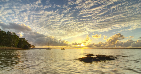 Summer sunrise over the Lake Cootharaba near Boreen Point, on the Sunshine Coast of Australia