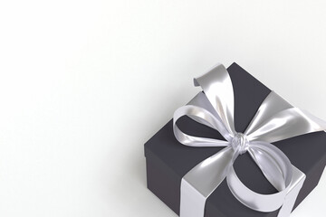 black gift box 3d with silver ribbon and bow on white background