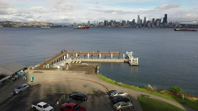 Drone footage of West Seattle, Alki Beach, Seacrest Park Cove, downtown Seattle, Harbor Island, Seattle Harbor, ferry and cruise terminals, Elliott Bay in Seattle, King County, Washington