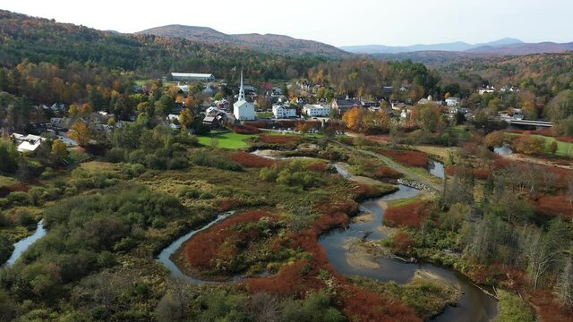 Stowe, Vermont USA. Aerial View of Cityscape Under Mount Mansfield on Sunny Fall Day. Colorful Landscape and Town, Drone Shot