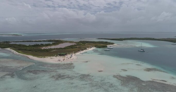 Francisky los roques venezuela Aerial Shot pan rigth , Big panorama Turist Bathers an the beach