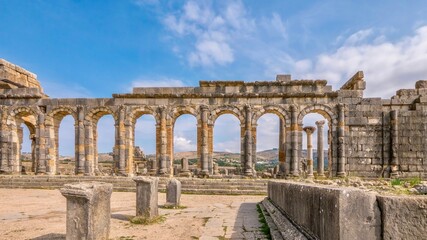 Exterior wall of the reconstructed basilica, built in the 3rd century AD, at Volubilis, a former Roman city now in ruins, near Meknes, Morocco.