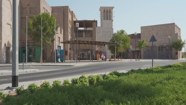 Peaceful Street With Traditional Buildings and Windcatcher In Al Fahidi Quarter In Old Dubai, United Arab Emirates. - Handheld, Wide Shot