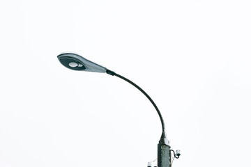 Old street lamp covered in snow