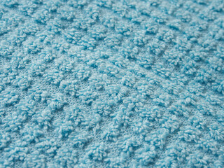 Knitted background. Knitted texture. A sample of knitting from wool. Knitting Pattern.