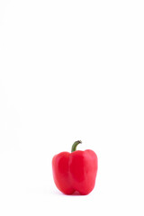 Vertical photo of red bell pepper full of vitamins on a white background