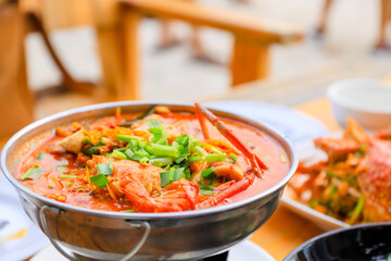 Tom yam Kung.Hot and sour seafood soup.Thai food in restaurant.Red chilli.Shrimp in a bowl.