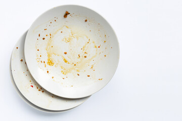 Dirty dishes on white background.