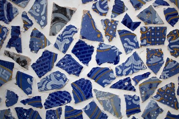 evocative image of blue colored mosaic texture with various shapes
