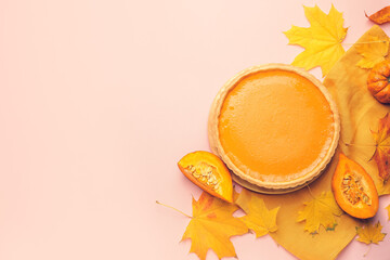 Composition with tasty pumpkin pie on color background